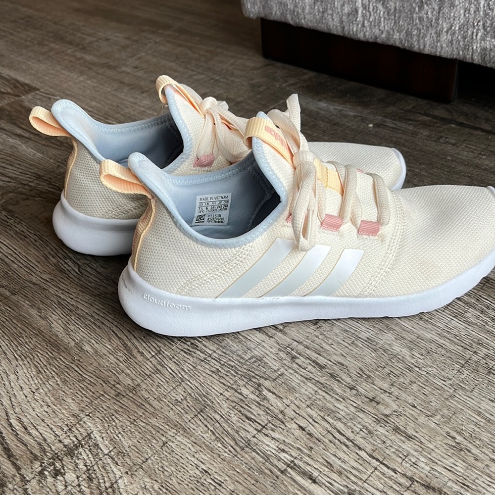 Adidas tennis shoes.